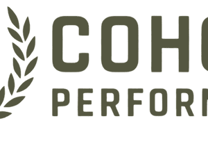 Cohort Performance logo with shield emblem.